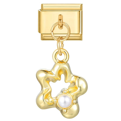 Goldene Love Charms – Eleganz trifft Zärtlichkeit