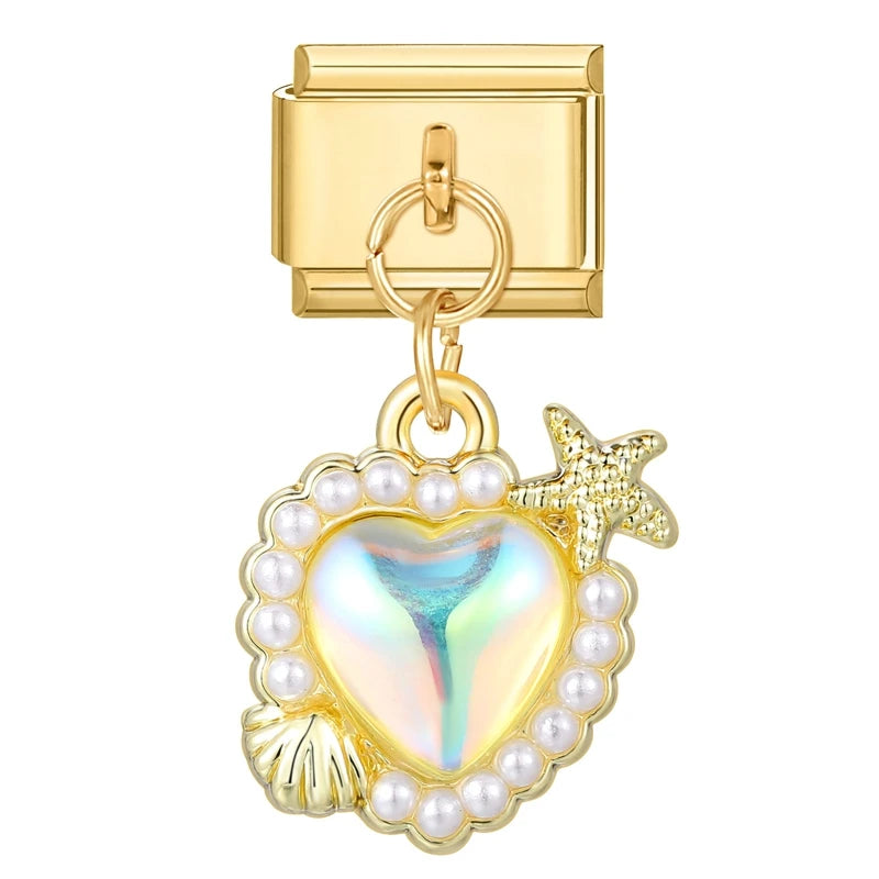 Goldene Love Charms – Eleganz trifft Zärtlichkeit