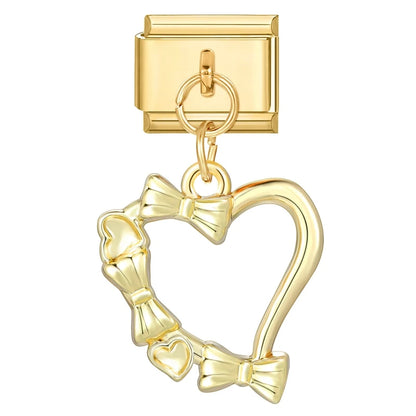 Goldene Love Charms – Eleganz trifft Zärtlichkeit